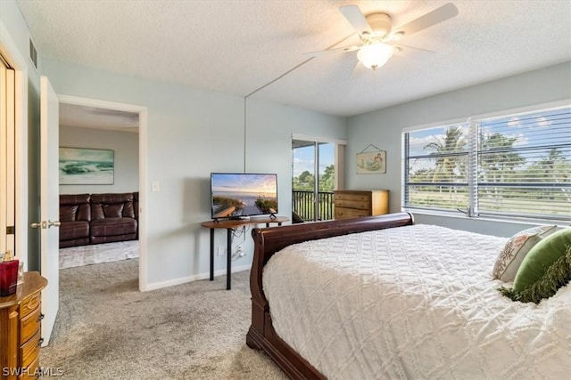 bedroom featuring access to exterior, light carpet, ceiling fan, a textured ceiling, and baseboards