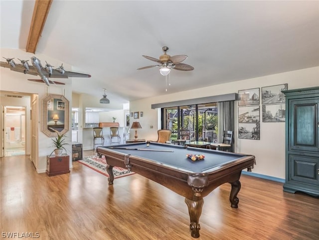 playroom with ceiling fan, wood-type flooring, lofted ceiling with beams, and pool table