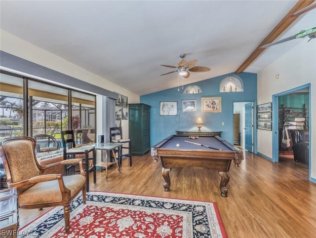 recreation room featuring vaulted ceiling with beams, hardwood / wood-style flooring, ceiling fan, and pool table