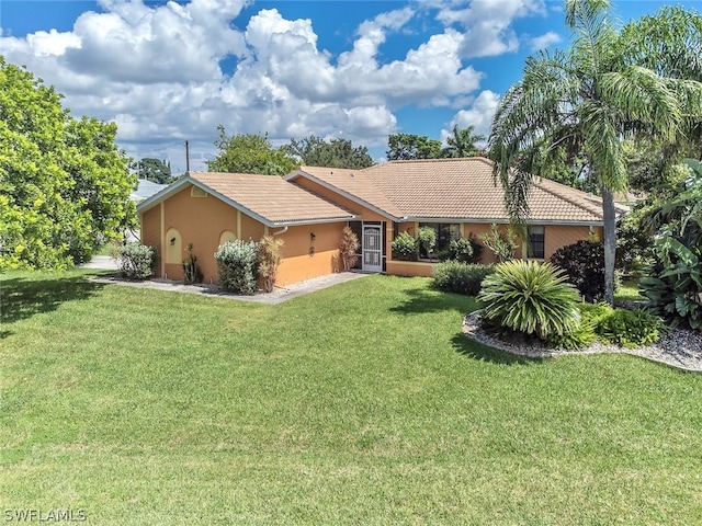 single story home with a front lawn