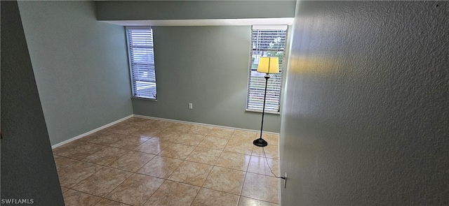 empty room featuring tile floors