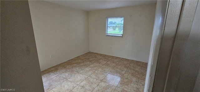 view of tiled spare room