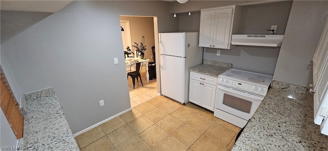 kitchen featuring light stone counters, white cabinetry, white appliances, and light tile floors