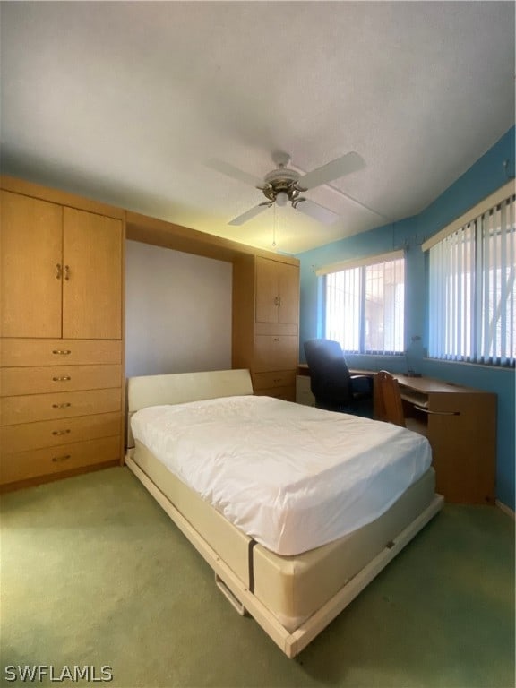 bedroom featuring carpet flooring and ceiling fan