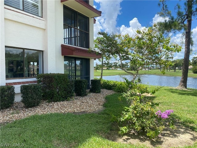 exterior space with a water view