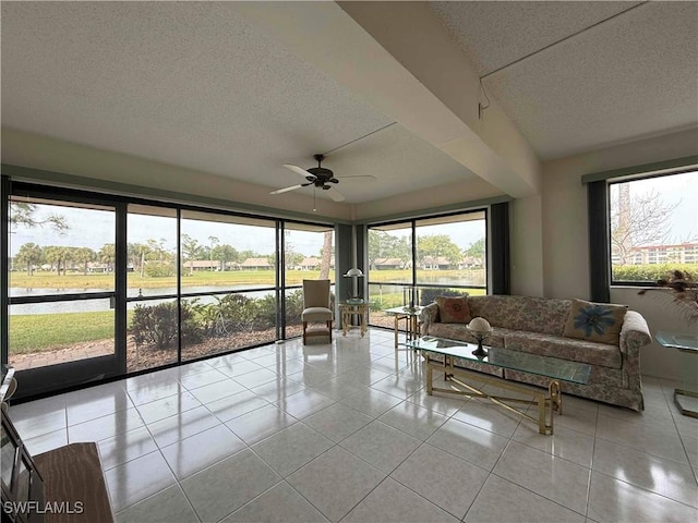 unfurnished sunroom with a water view