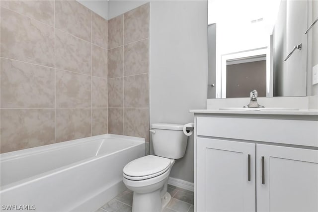 full bathroom with shower / tub combination, vanity, toilet, and tile patterned floors