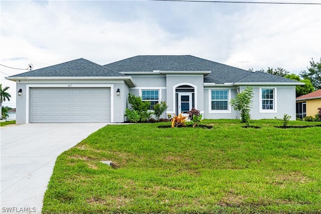 ranch-style house with a garage and a front yard