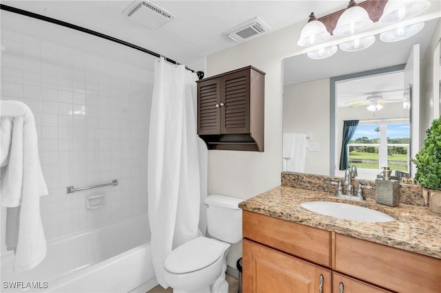 full bathroom featuring ceiling fan, toilet, shower / bath combo with shower curtain, and vanity