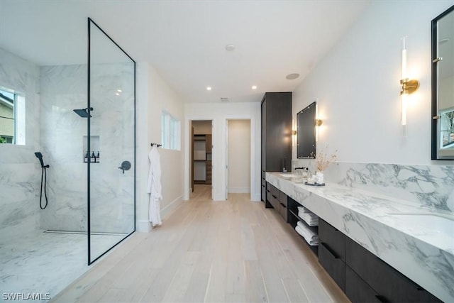 bathroom featuring vanity and hardwood / wood-style flooring