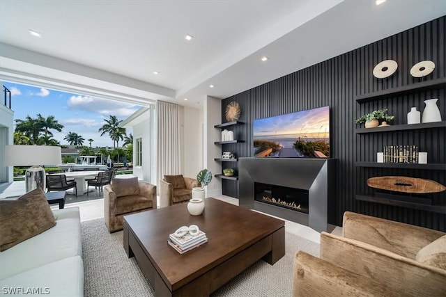 living room featuring built in shelves