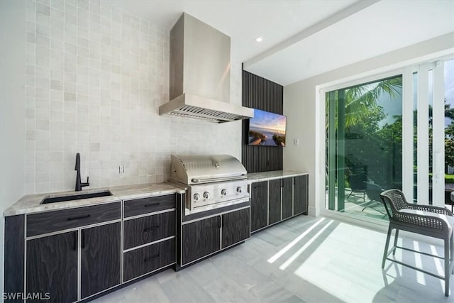 view of patio / terrace featuring an outdoor kitchen, grilling area, and sink