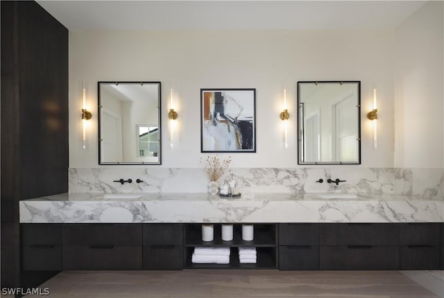 bathroom with vanity and wood-type flooring