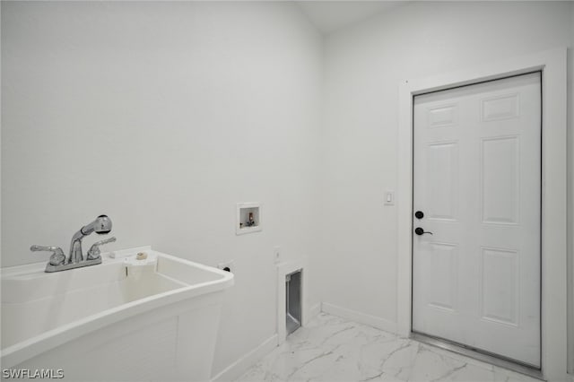 laundry area featuring electric dryer hookup, light tile patterned floors, and washer hookup