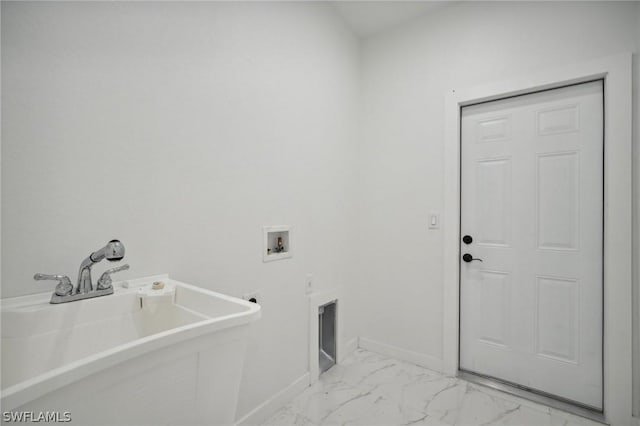 laundry area featuring washer hookup and sink