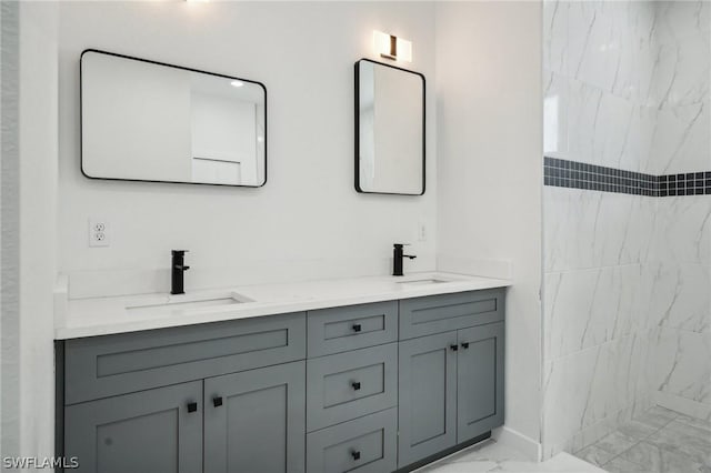 bathroom featuring vanity and a tile shower