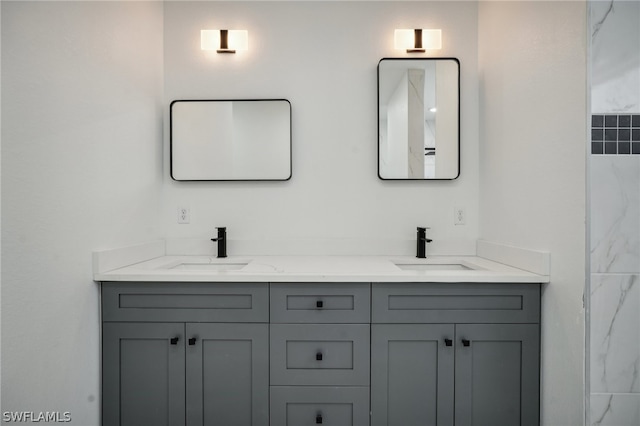 bathroom with dual vanity