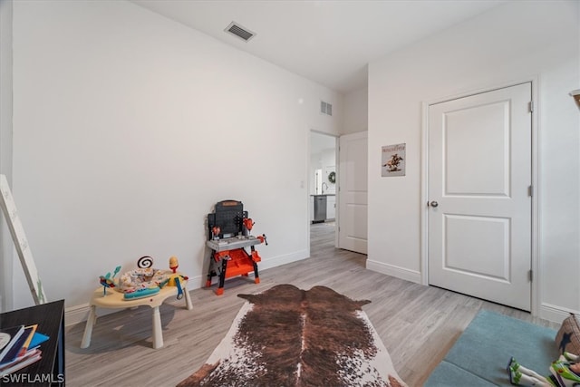 rec room featuring light hardwood / wood-style floors