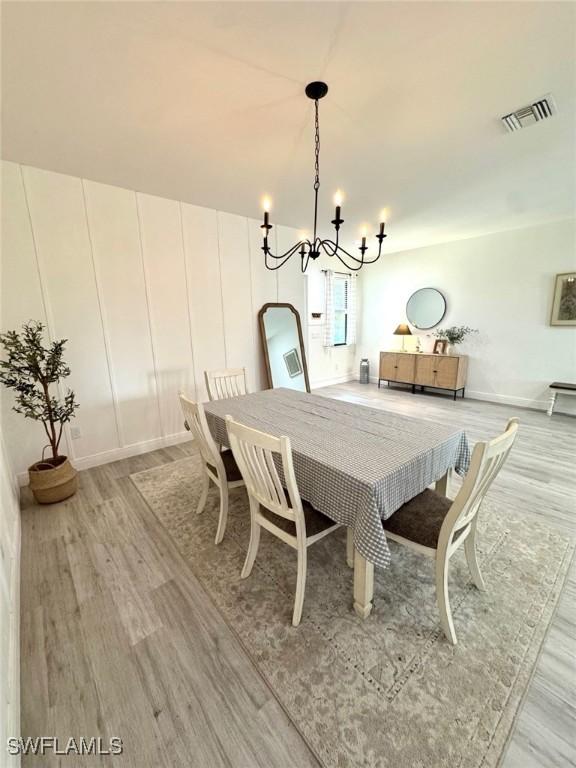 dining room featuring light hardwood / wood-style flooring