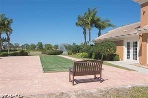 4171 Los Altos Ct, Naples, FL 34109 - view of community featuring a patio