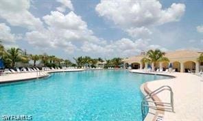 4171 Los Altos Ct, Naples, FL 34109 - pool with a patio