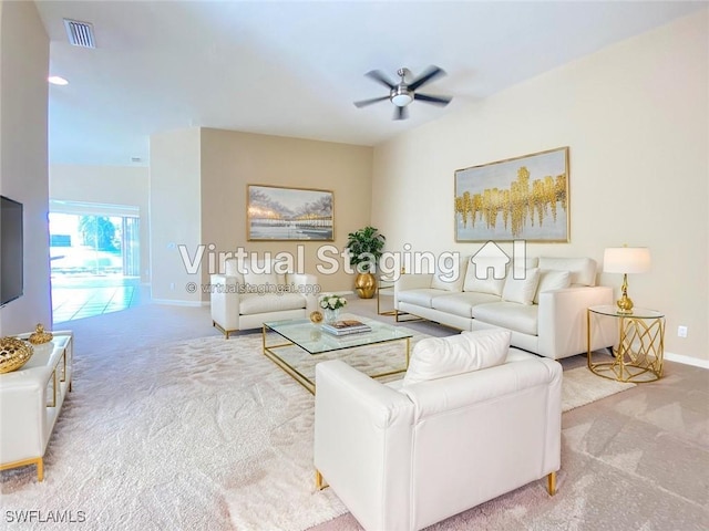 4171 Los Altos Ct, Naples, FL 34109 - carpeted living area featuring visible vents, baseboards, and ceiling fan