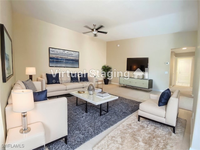 living room featuring ceiling fan