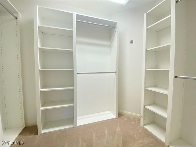 4171 Los Altos Ct, Naples, FL 34109 - spacious closet featuring carpet