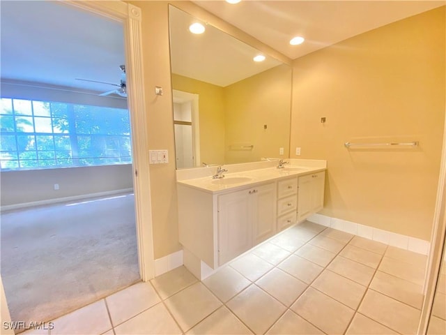 4171 Los Altos Ct, Naples, FL 34109 - full bath featuring double vanity, baseboards, a sink, and tile patterned flooring