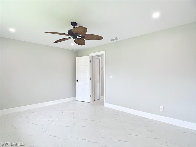 spare room featuring ceiling fan