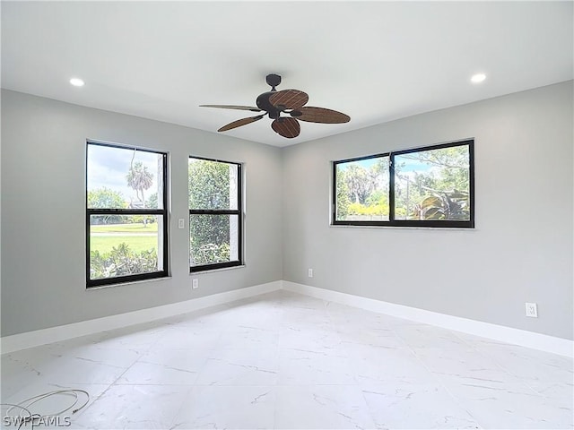 unfurnished room featuring ceiling fan