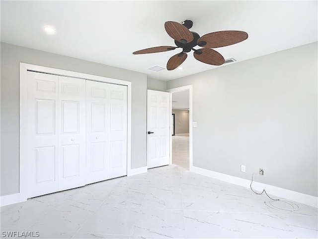 unfurnished bedroom with a closet and ceiling fan