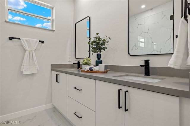 bathroom with vanity and walk in shower