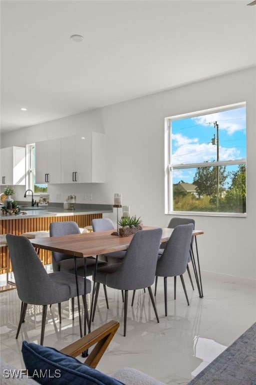 dining space with sink