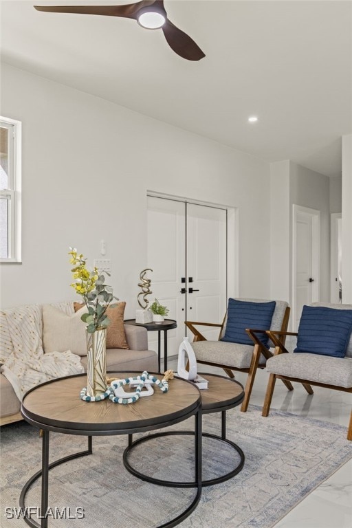 living room featuring ceiling fan