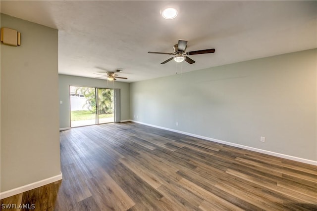 4508 Santa Barbara Blvd Unit 102, Cape Coral, FL 33914 - spare room featuring baseboards, dark wood finished floors, and ceiling fan