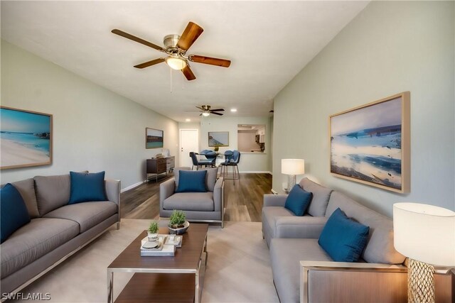 4508 Santa Barbara Blvd Unit 102, Cape Coral, FL 33914 - living area featuring wood finished floors, ceiling fan, baseboards, and recessed lighting