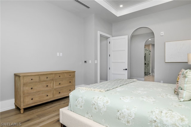 bedroom featuring light wood-type flooring