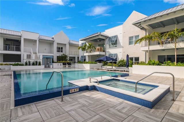 view of pool featuring a community hot tub