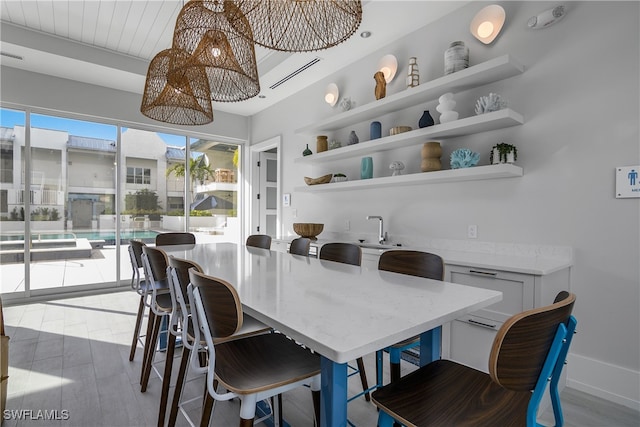 dining area with hardwood / wood-style floors