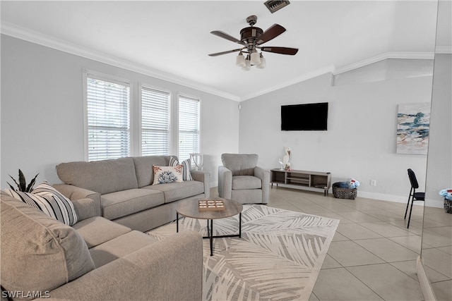 living room with vaulted ceiling, crown molding, light tile patterned floors, and ceiling fan