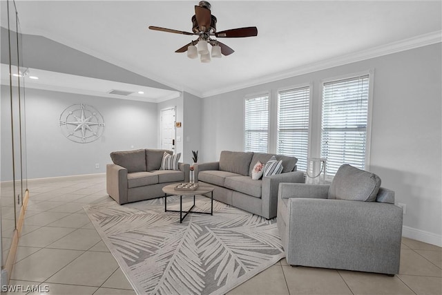 living room with crown molding, light tile patterned floors, visible vents, vaulted ceiling, and baseboards