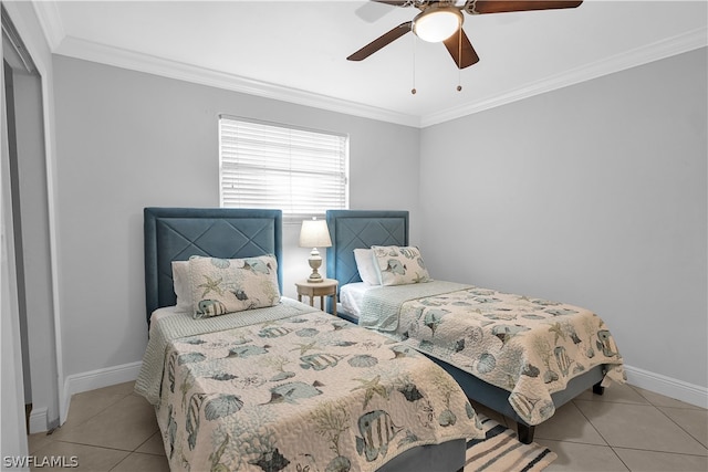 bedroom featuring ceiling fan, light tile patterned floors, and ornamental molding