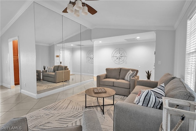 tiled living room featuring vaulted ceiling, crown molding, a wealth of natural light, and ceiling fan