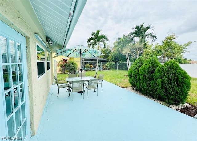 view of patio / terrace with outdoor dining area and a fenced backyard