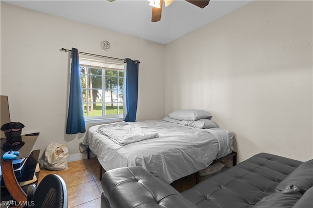 bedroom featuring tile patterned flooring and ceiling fan