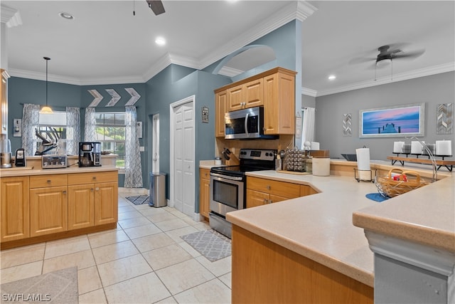 kitchen with crown molding, light tile patterned floors, ceiling fan, stainless steel appliances, and decorative light fixtures