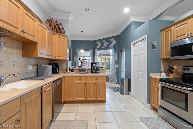 kitchen with tasteful backsplash, stainless steel appliances, pendant lighting, light tile patterned flooring, and ornamental molding