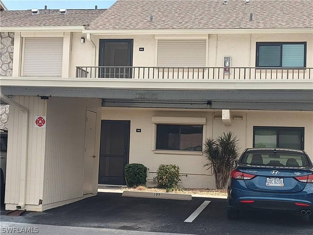 entrance to property with a balcony