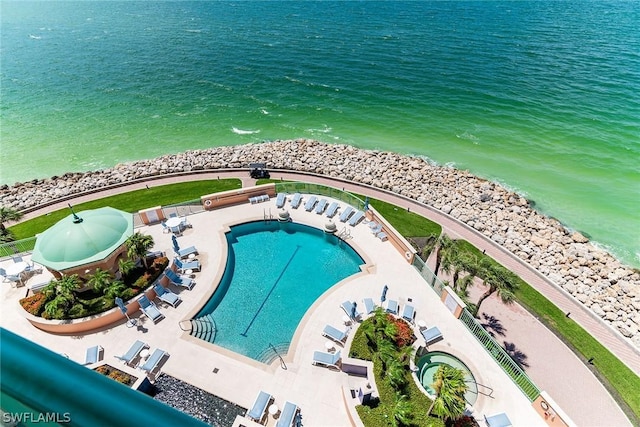 birds eye view of property featuring a water view